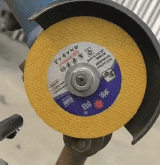 How do you change a grinder cutting wheel?