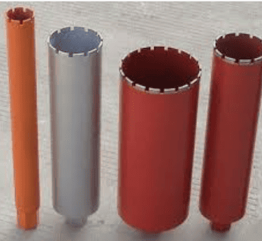 What is the difference between a rotary drill and a core drill